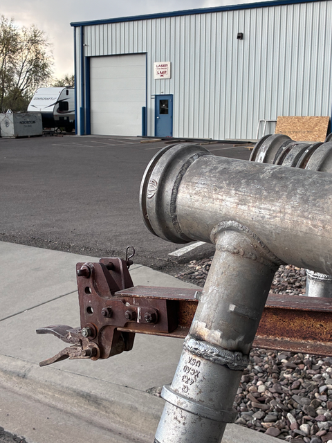 Industrial pipe and exhaust elbow assembly