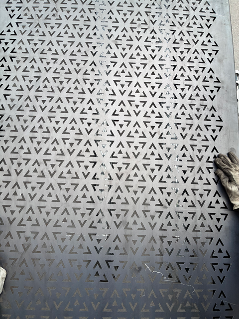 Decorative perforated metal panel