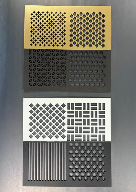 Sample sheet of decorative metal perforation patterns