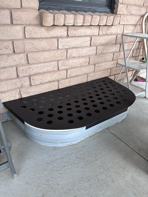 Custom window well cover with perforated steel